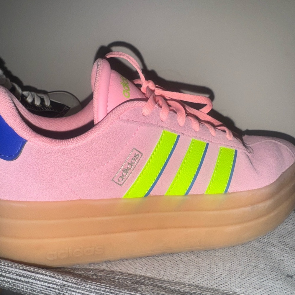 Adidas Pink Sneakers with Neon Yellow Stripes